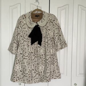 Dress jacket with black bow